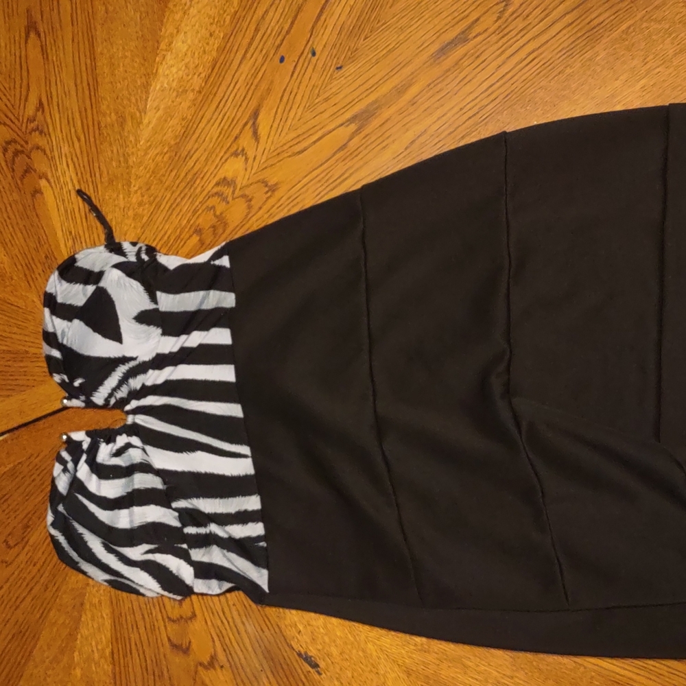 A black and zebra print strapless dress
